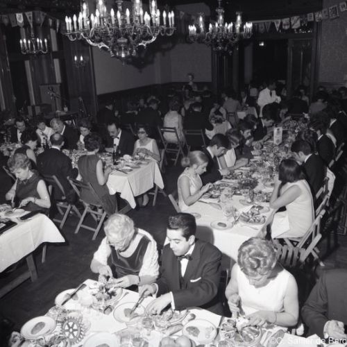 Photos en noir et blanc d'un dîner de Rotary au Château de Lignères.